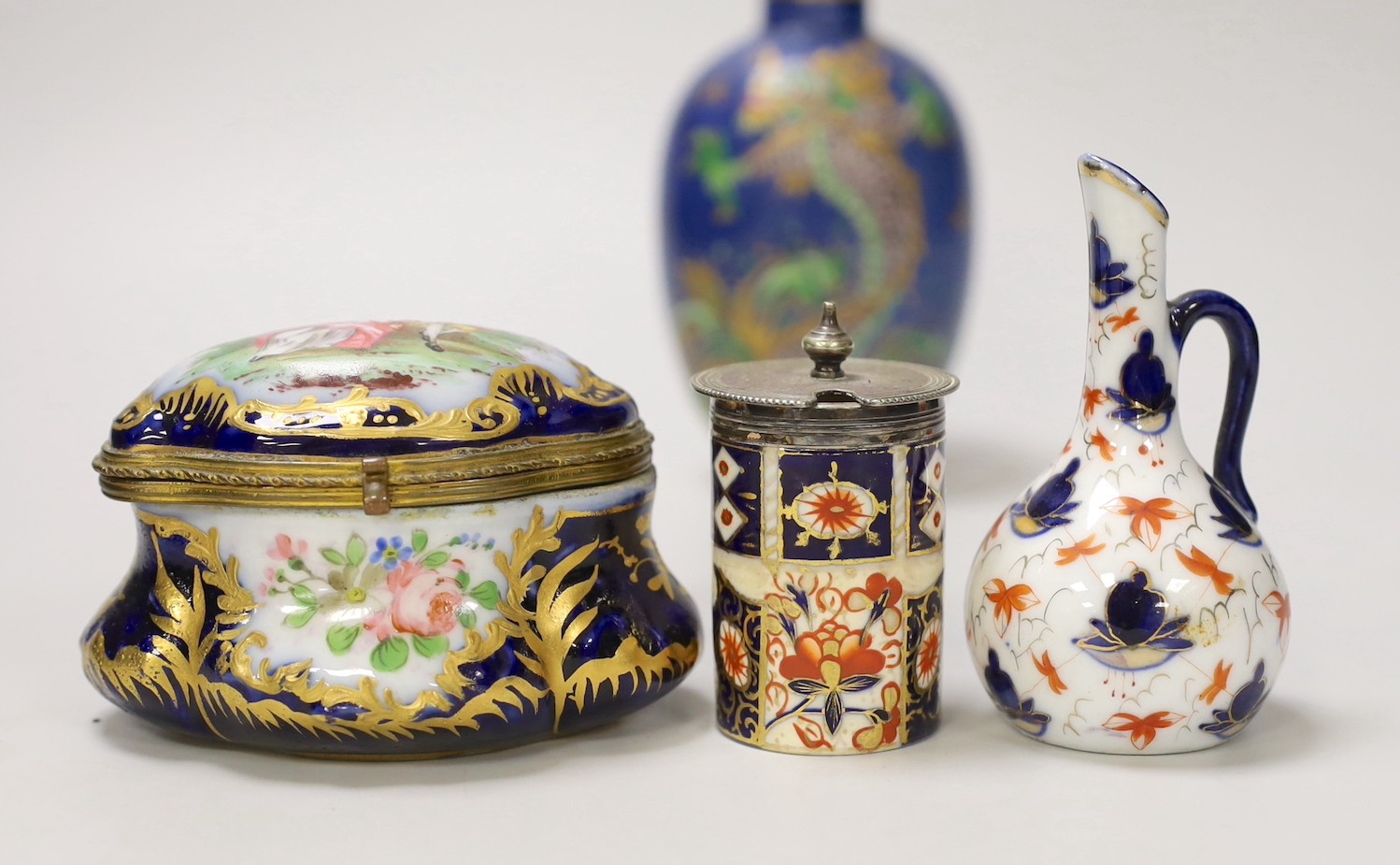 A pair of Vienna style porcelain pink ground vases, late 19th century, a Sevres style trinket box, and other ceramics. Tallest 16cm